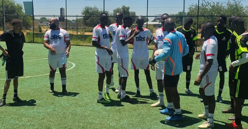 Team huddle on the pitch